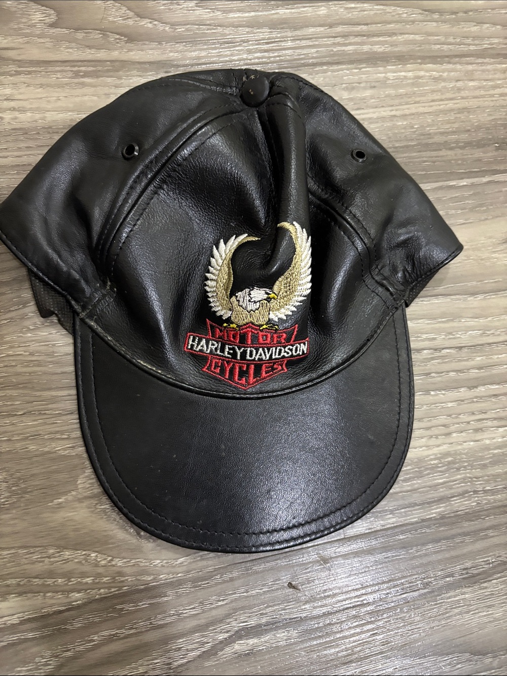Vintage Harley-Davidson Black Leather Cap with Gold Eagle Patch